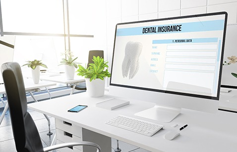 Dental insurance form on large computer monitor