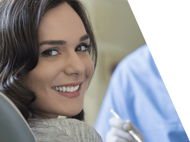 Woman smiling during an emergency dentistry visit