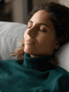 Woman resting after sedation dentistry visit