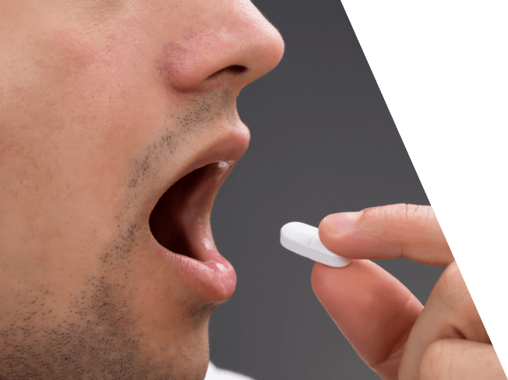 Dental patient taking oral conscious sedation dentistry pill