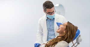 Patient talking to their dentist