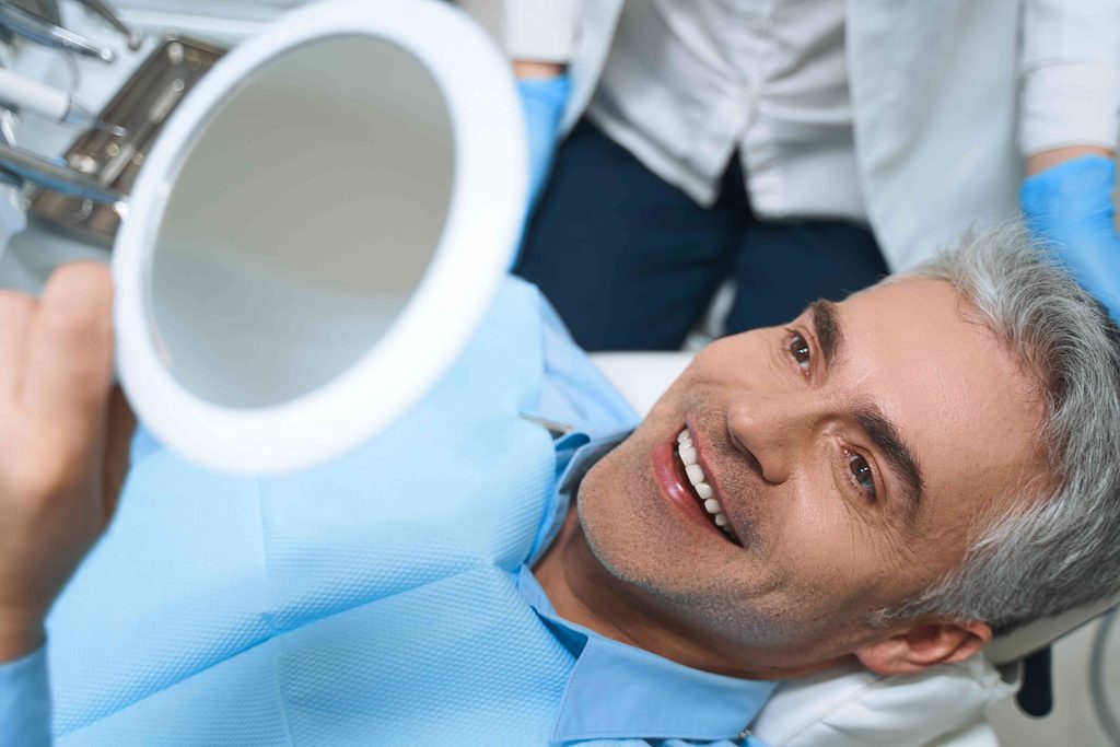 Man smiling in the dental chair